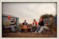 Group of hunters around the firepit