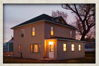 Front view of the hunting lodge at dusk